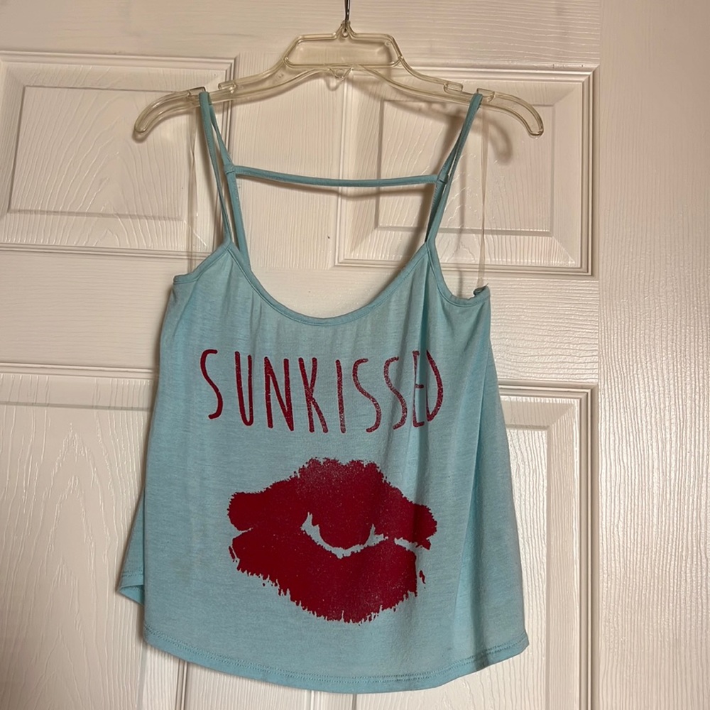 Loose light blue spaghetti strap crop top